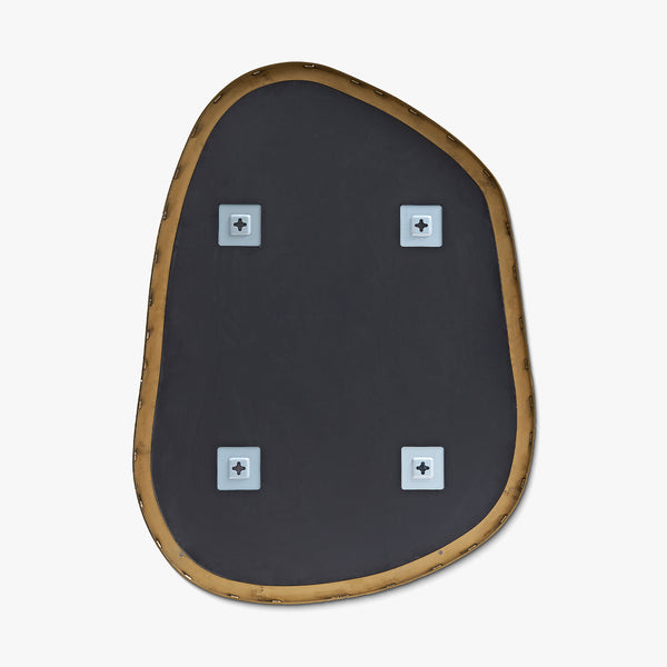 Back view of an asymmetrical mirror showing rear mounting brackets and brass-colored frame.