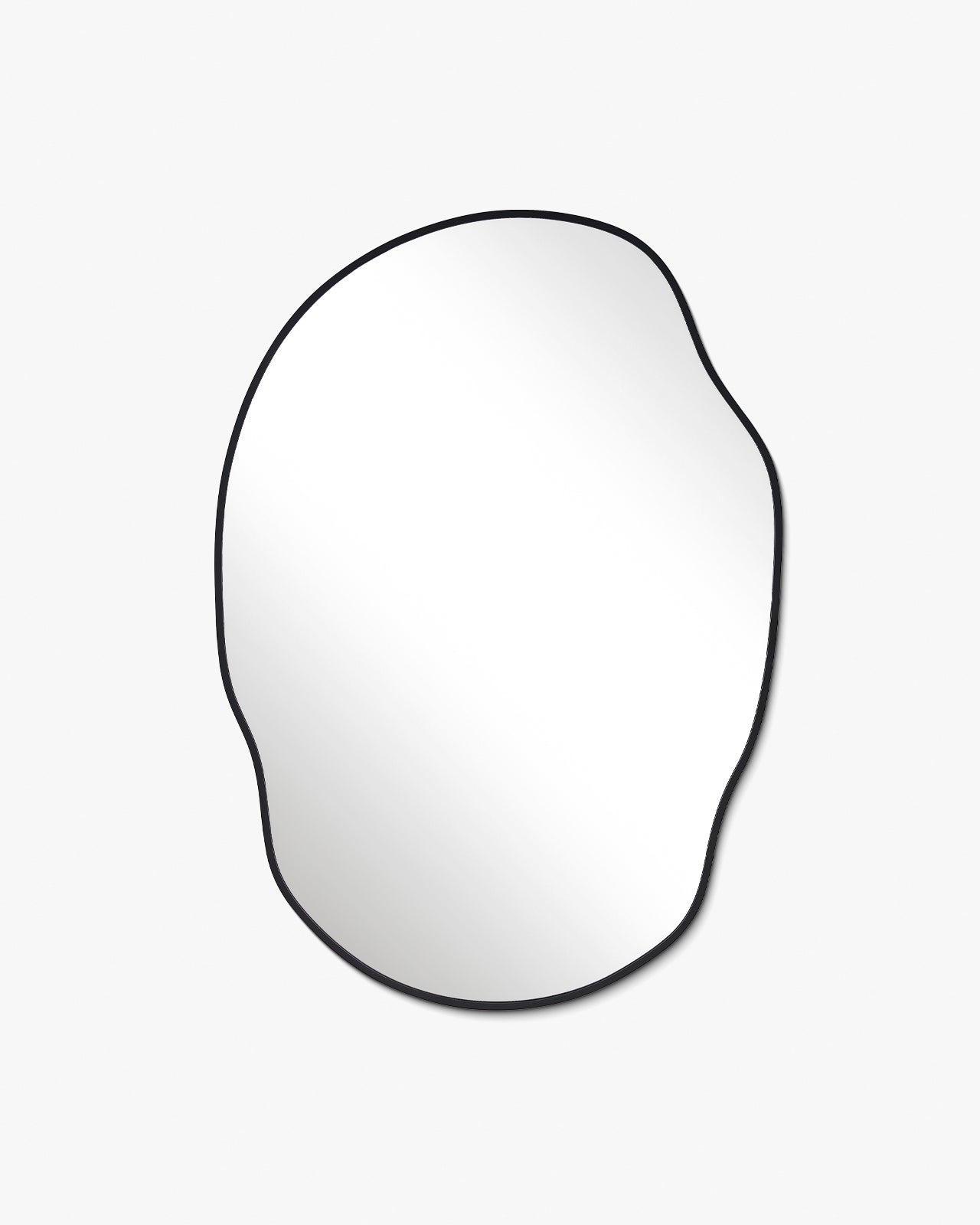 Irregular-shaped wall mirror with a slim black metal frame on a white background.