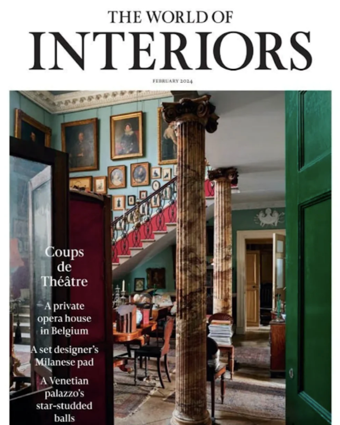 The World of Interiors February 2024 cover showing a classical interior with columns, artwork, and a staircase.