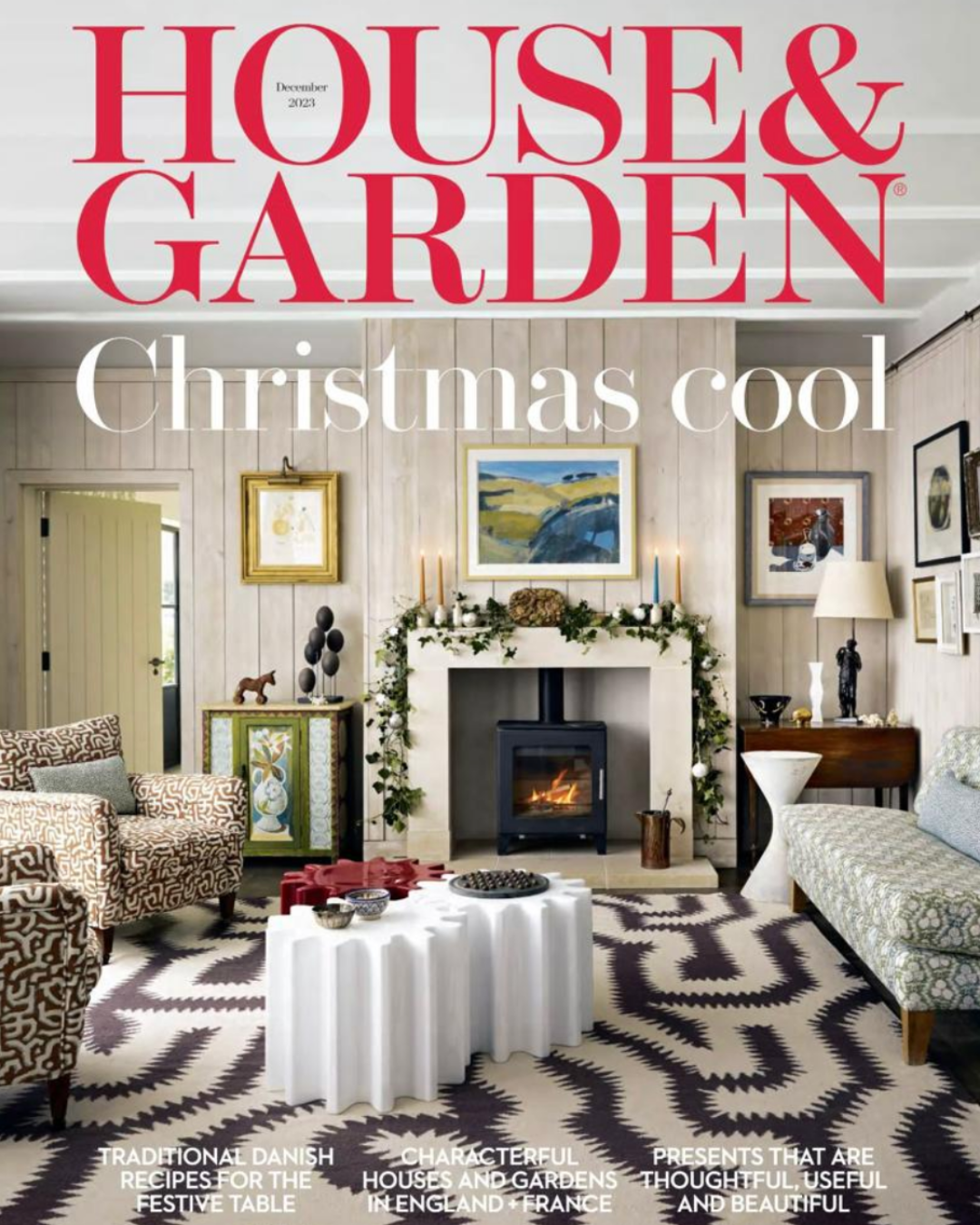 House & Garden December 2023 cover showing a stylish living room with a fireplace and Christmas decor.