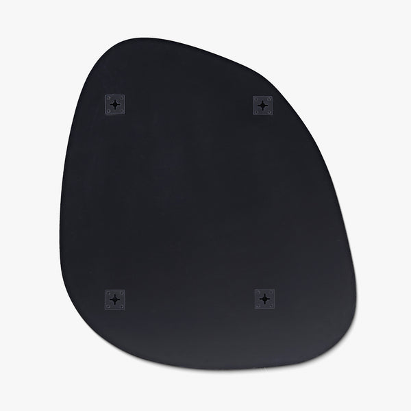 Back view of a frameless blob-shaped wall mirror showing matte black backing with four integrated metal mounting brackets.